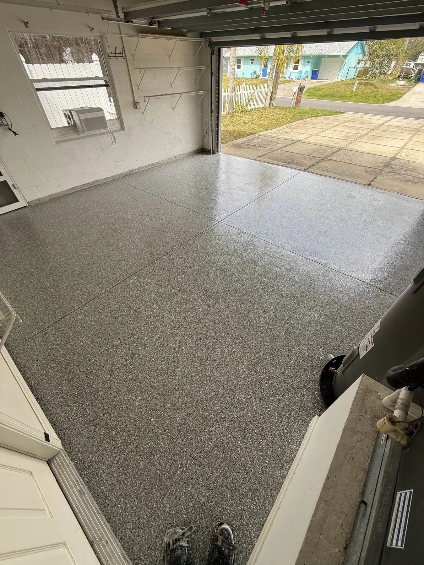 Decorative full flake garage floor coating in Central Florida