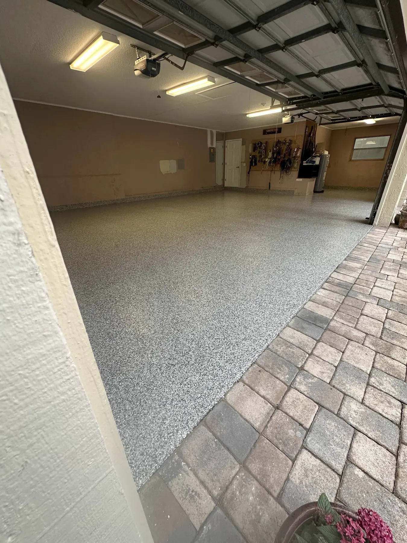 Custom flake garage floor installed by PolyCoat Solutions