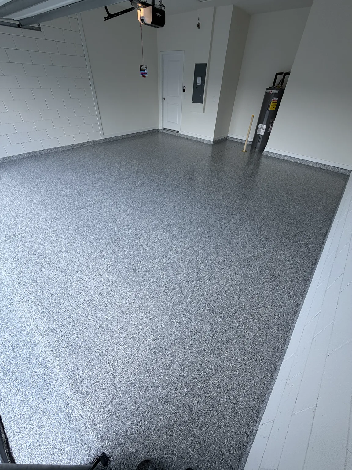 Light gray polyaspartic flake garage floor in Central Florida