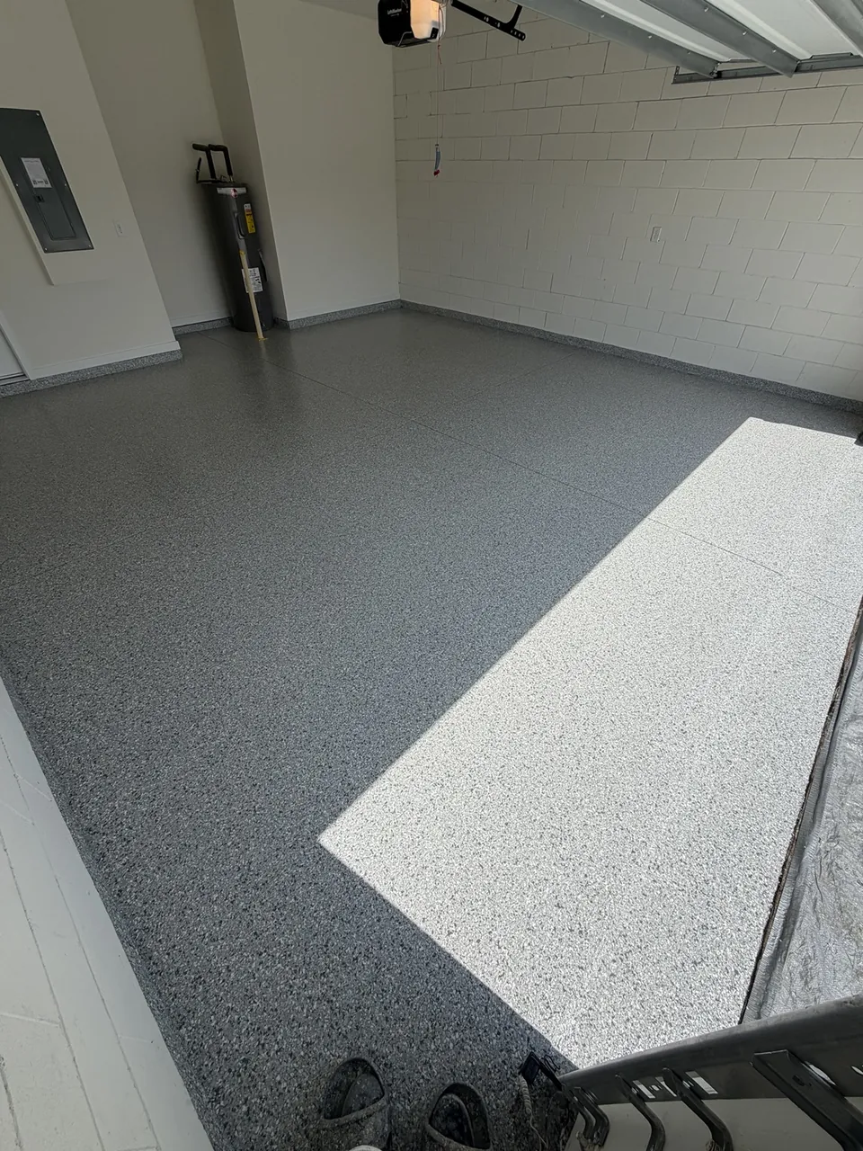 Smooth gray decorative coating in a residential garage