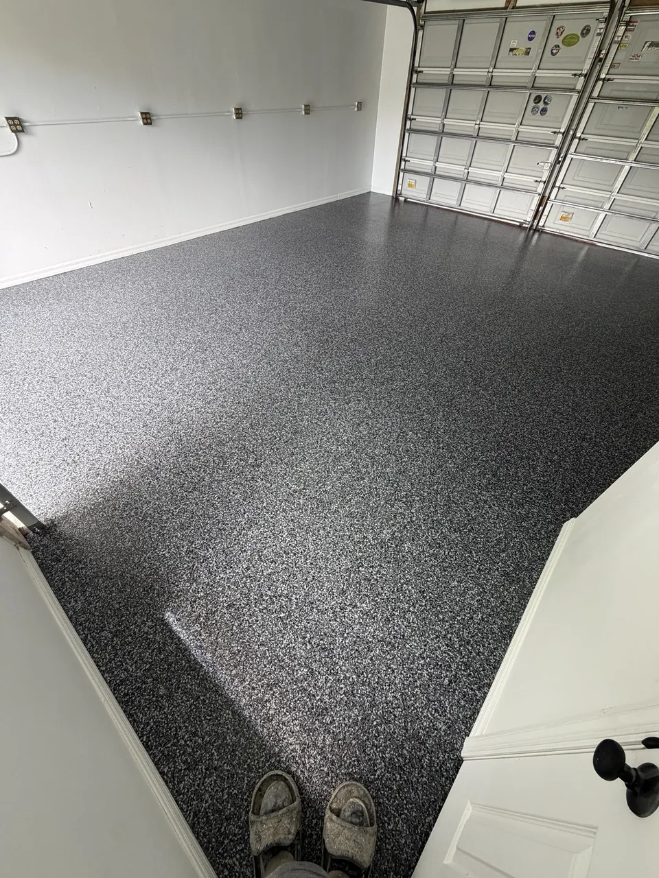 Gray full flake floor in a two car garage