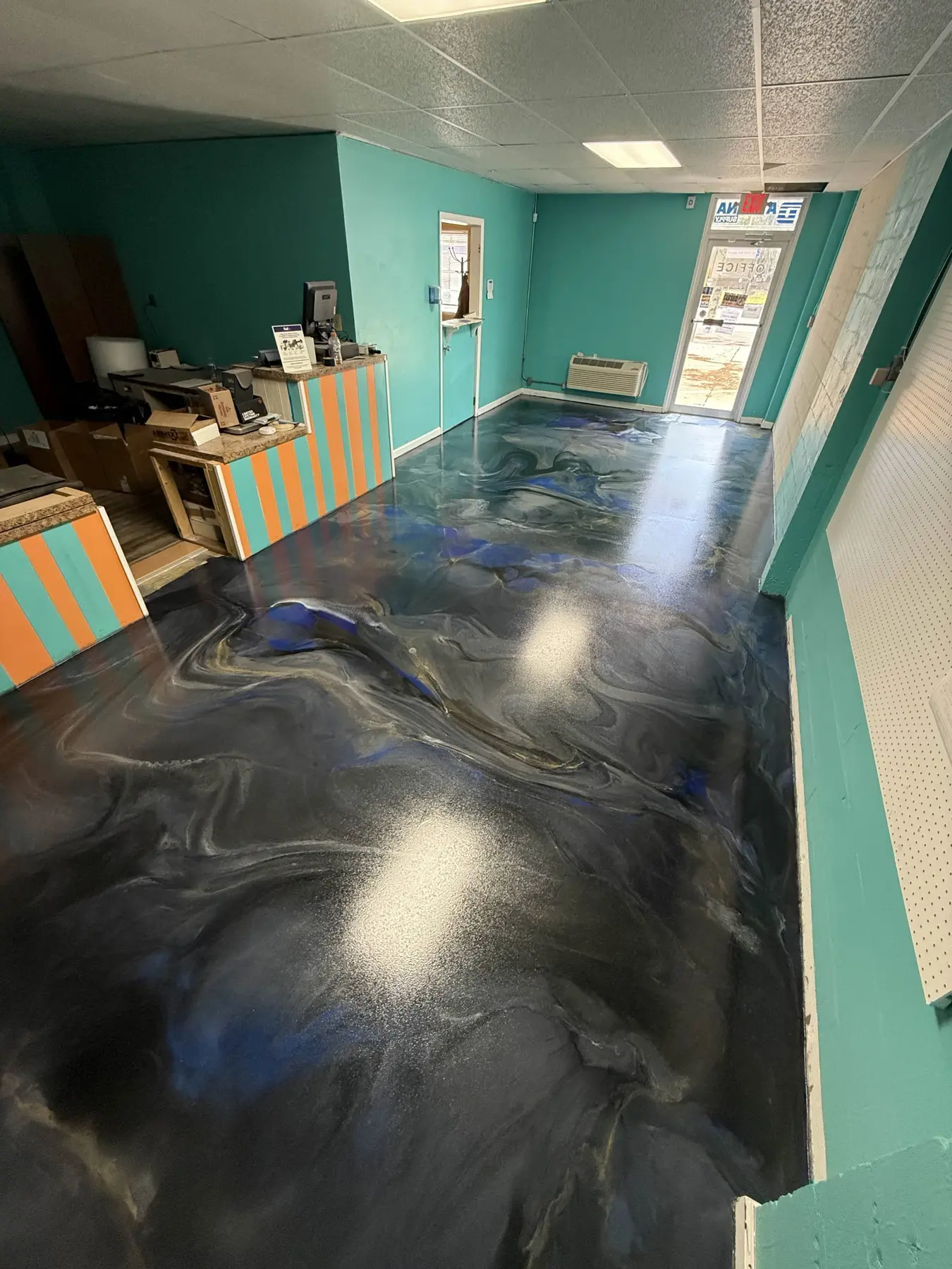 One of a kind decorative metallic epoxy installation