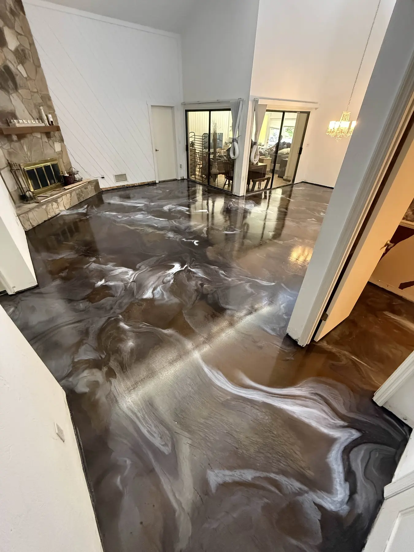 Finished metallic epoxy interior floor by PolyCoat Solutions