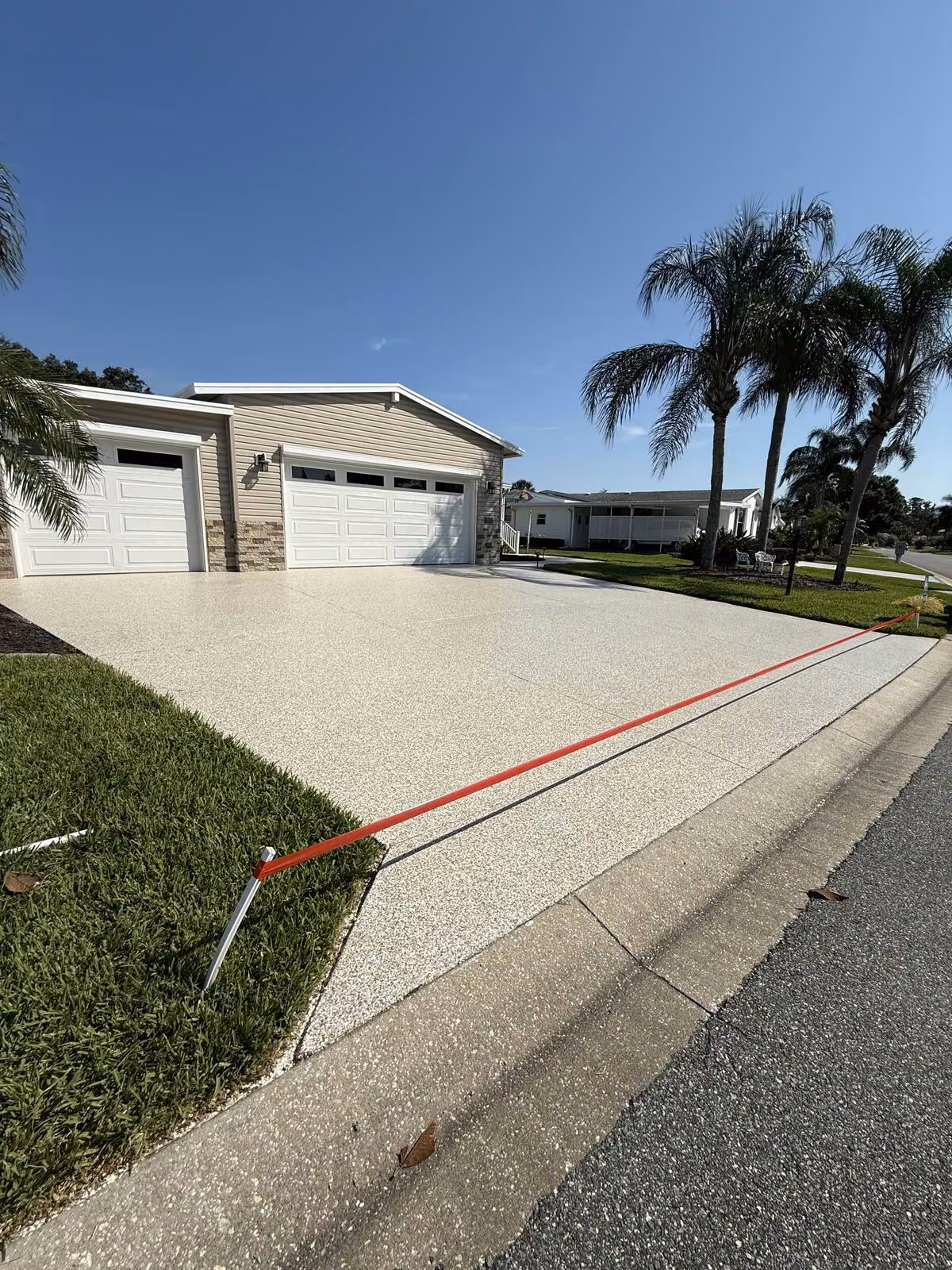 Driveway Coatings installed by PolyCoat Solutions in Central Florida