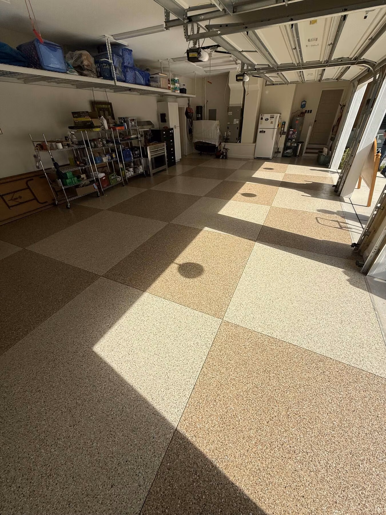 Two tone checkered polyaspartic garage floor by PolyCoat Solutions