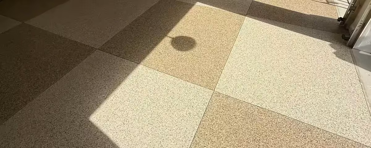 Checkered two tone polyaspartic flake garage floor by PolyCoat Solutions